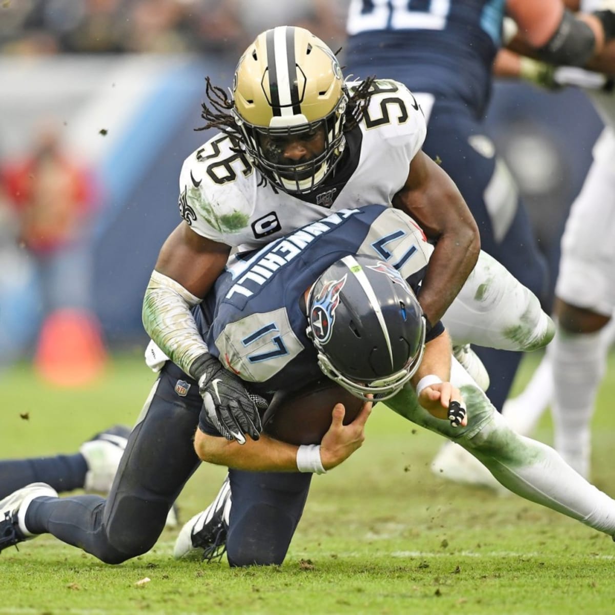 New Orleans Saints cornerback Alontae Taylor, left, tackles Tennessee  Titans wide receiver Nick Westbrook-Ikhine, right, after a catch in the  first half of an NFL football game in New Orleans, Sunday, Sept.