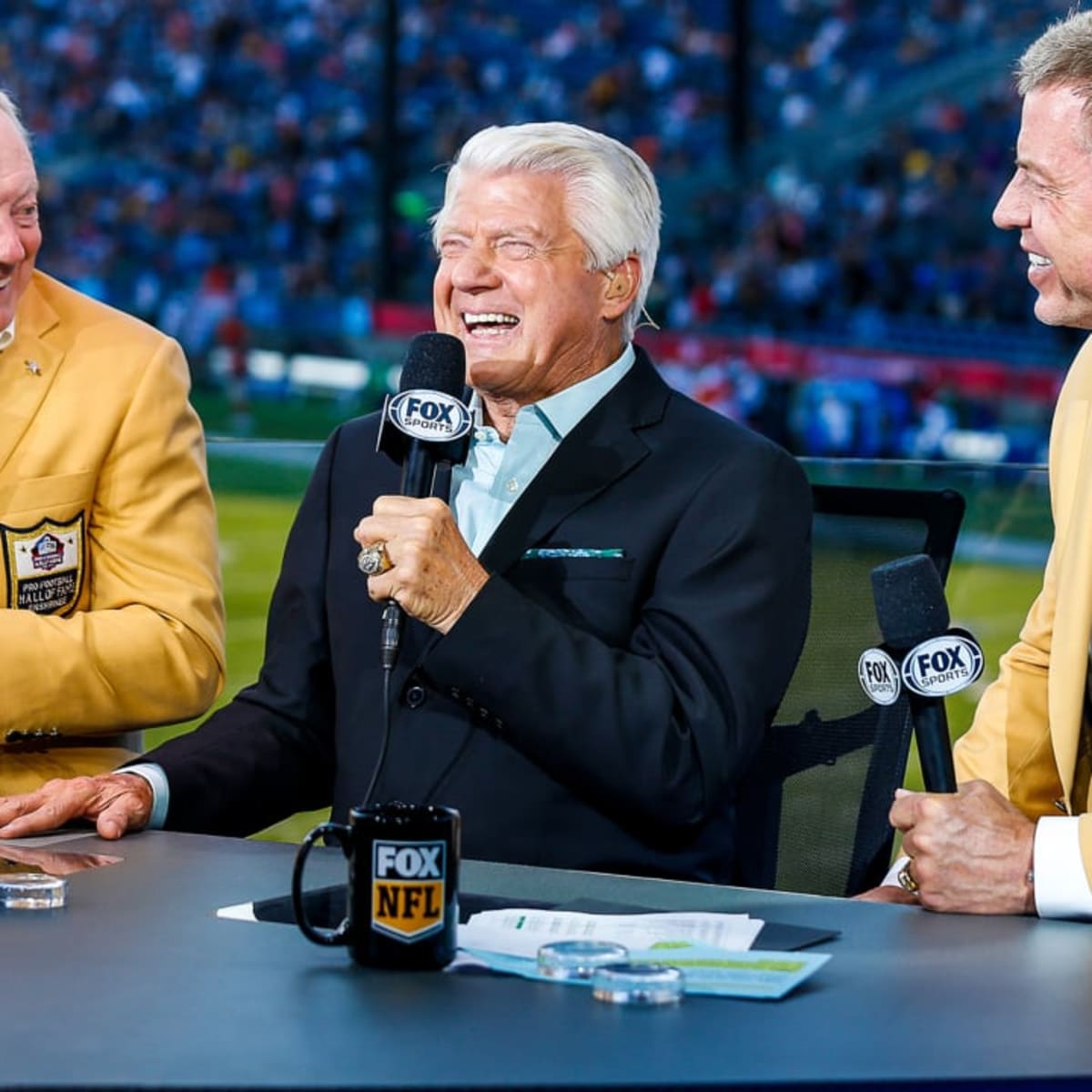 Dallas Cowboys owner Jerry Jones introduces former players, from left,  Emmitt Smith, Michael Irvin and Troy Aikman. The three were inducted into  the Cowboy's Ring of Honor at Texas Stadium during halftime