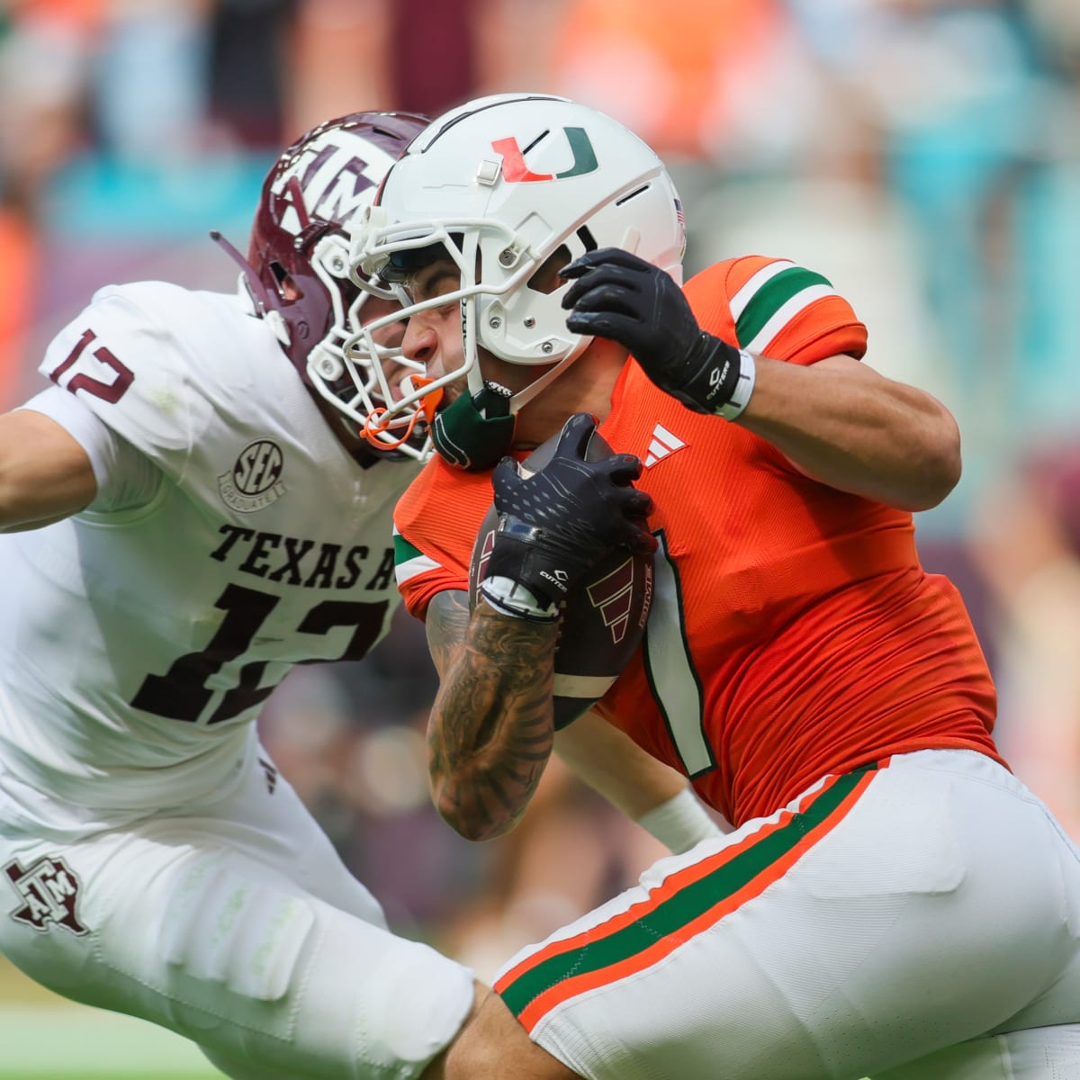 Tyler Van Dyke throws 5 TD passes in Miami's statement 48-33 win over No.  23 Texas A&M