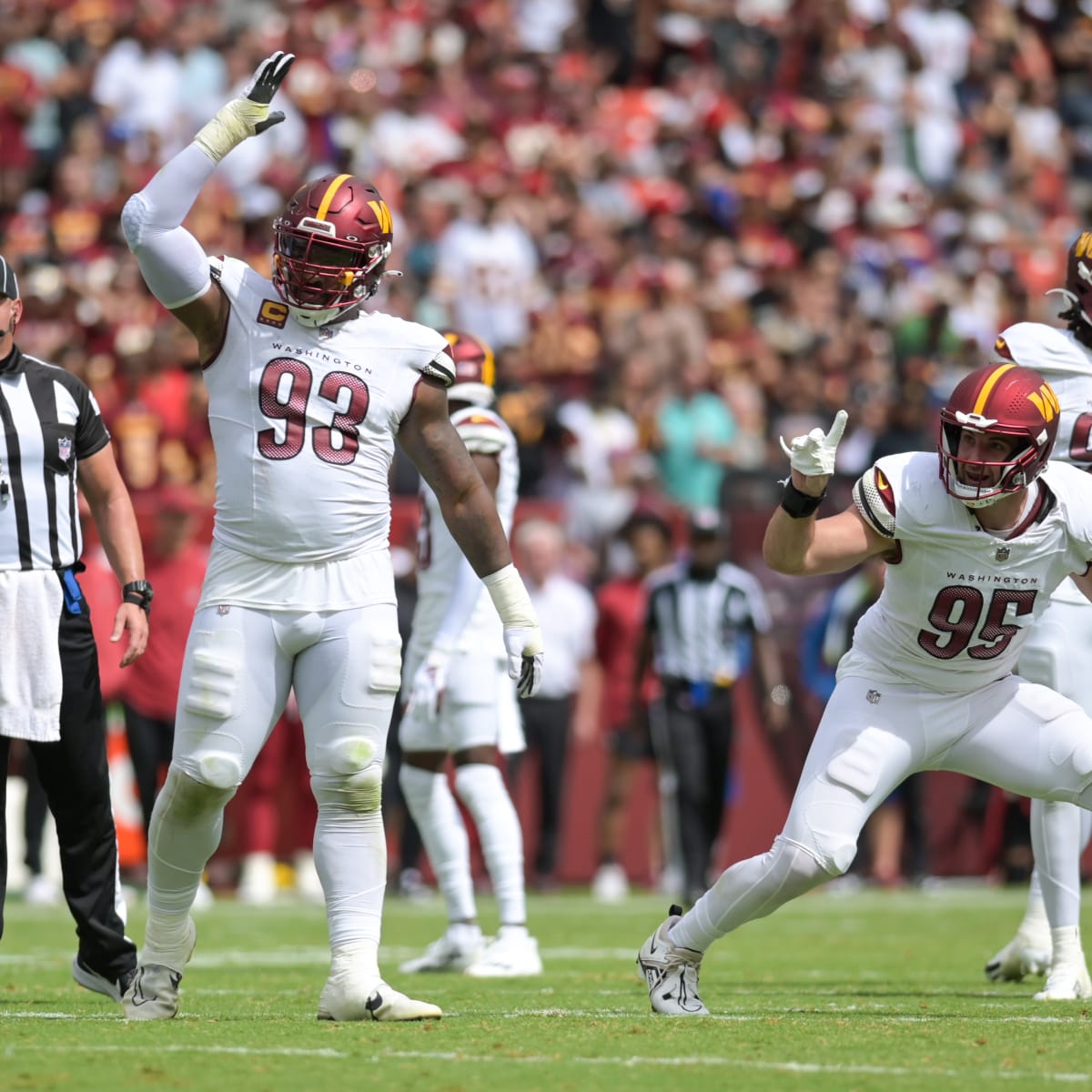 Washington Commanders defensive tackle Jonathan Allen (93) runs off the  field following the team's win over the Houston Texans in an NFL football  game Sunday, Nov. 20, 2022, in Houston. (AP Photo/David