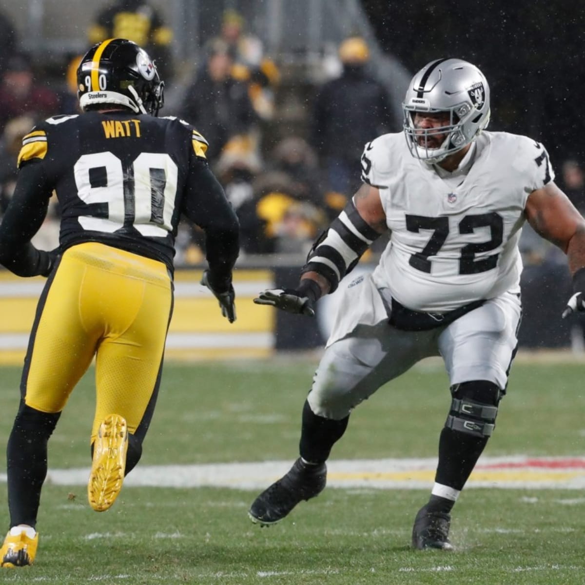 NASHVILLE, TN - SEPTEMBER 25: Las Vegas Raiders offensive tackle Thayer  Munford Jr. (77) looks on during warmups before the game between the  Tennessee Titans and the Las Vegas Raiders on September