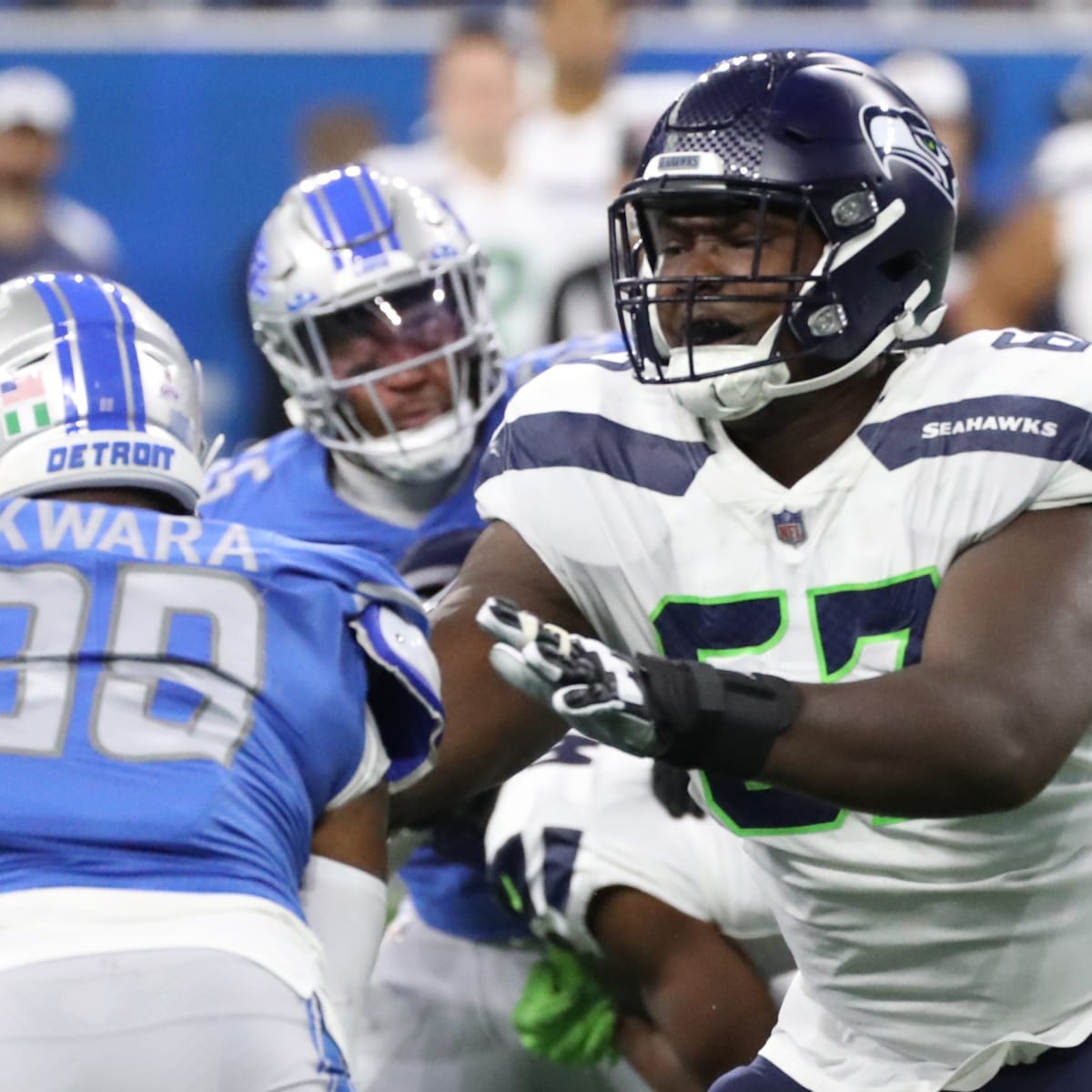 Seattle Seahawks tackle Abraham Lucas (72) walks on the field