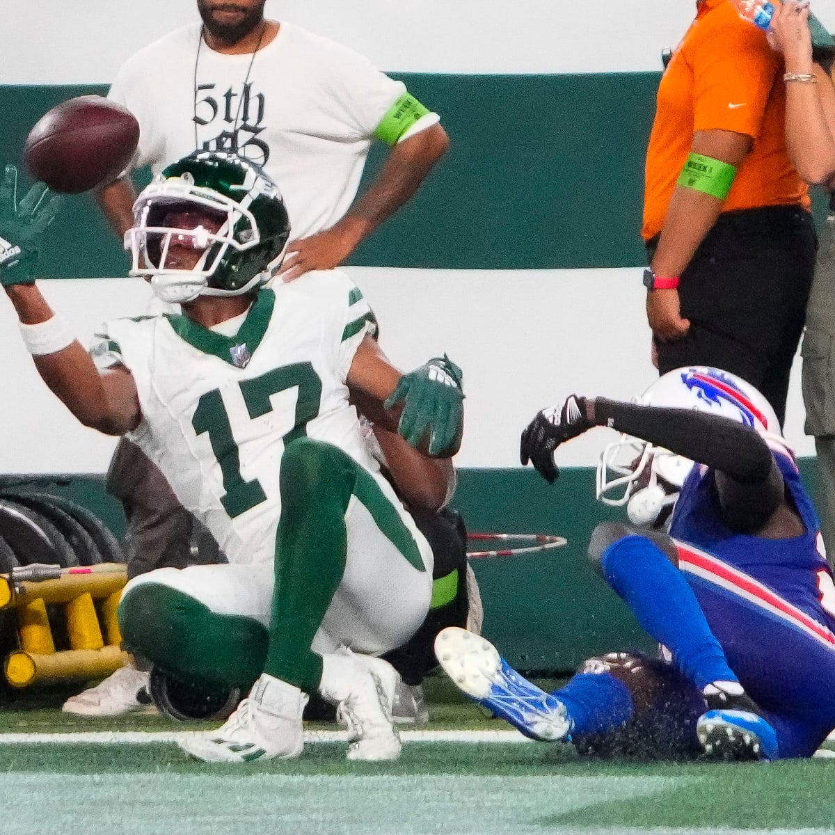 New York Jets wide receiver Garrett Wilson (17) warms up before taking on  the Miami Dolphins during an NFL football game Sunday, Oct. 9, 2022, in  East Rutherford, N.J. (AP Photo/Adam Hunger