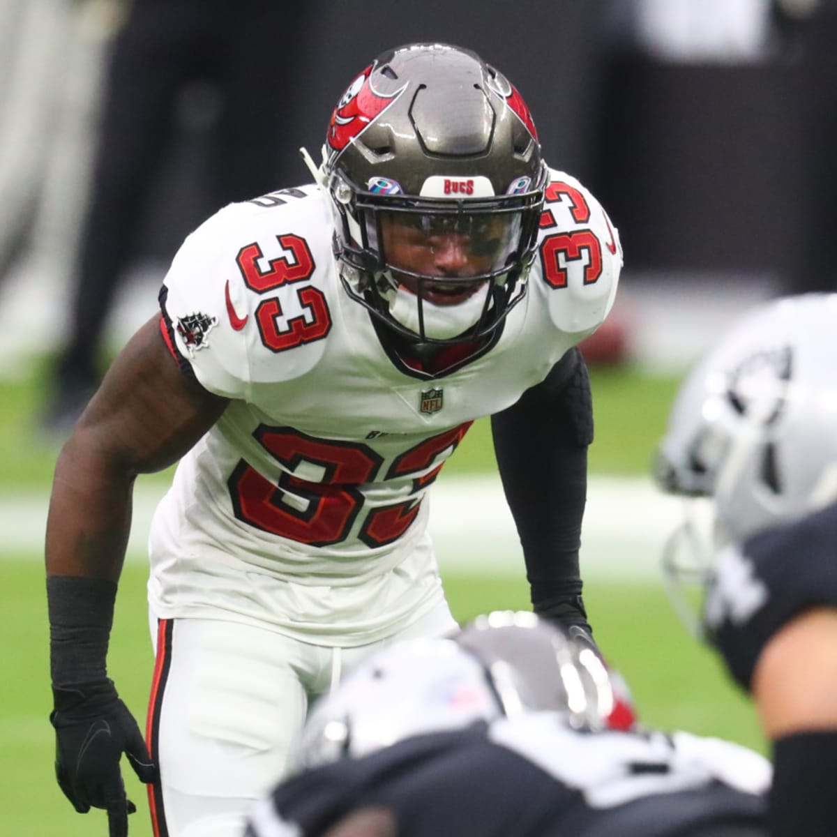 Tampa Bay Buccaneers free safety Jordan Whitehead (33) lines up on defense  during an NFL football game against the Carolina Panthers, Sunday, Dec. 26,  2021, in Charlotte, N.C. (AP Photo/Brian Westerholt Stock