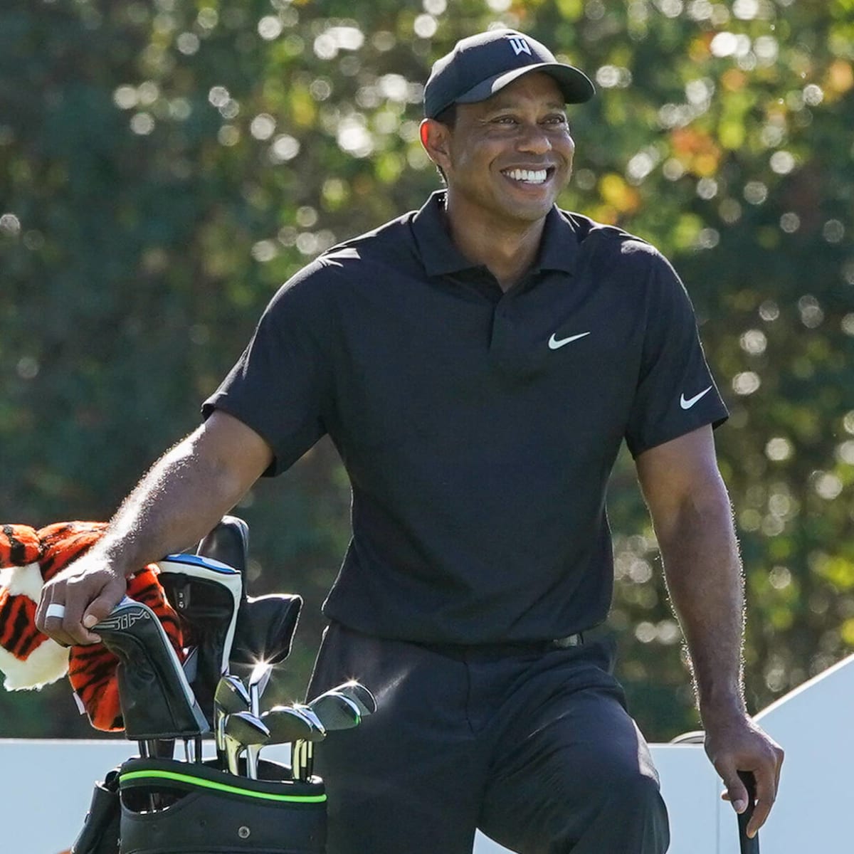 Tiger Woods, Justin Timberlake Tee Off Sports Bar in NYC