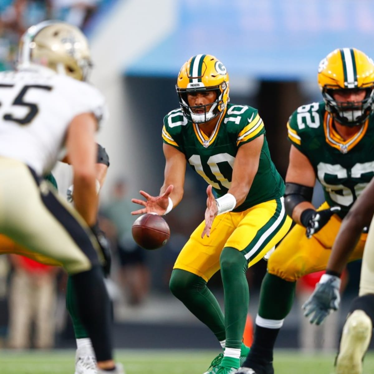 Green Bay Packers' Jordan Love runs during the first half of a preseason  NFL football game against the New Orleans Saints Friday, Aug. 19, 2022, in  Green Bay, Wis. (AP Photo/Morry Gash