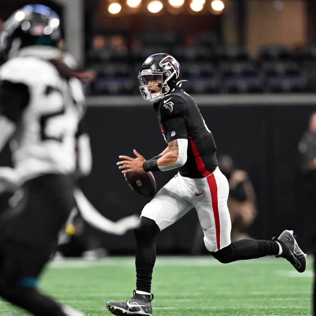 Atlanta Falcons quarterback Desmond Ridder (4) lines up during the second  half of an NFL football game against the Jacksonville Jaguars, Saturday,  Aug. 27, 2022, in Atlanta. The Atlanta Falcons won 28-12. (