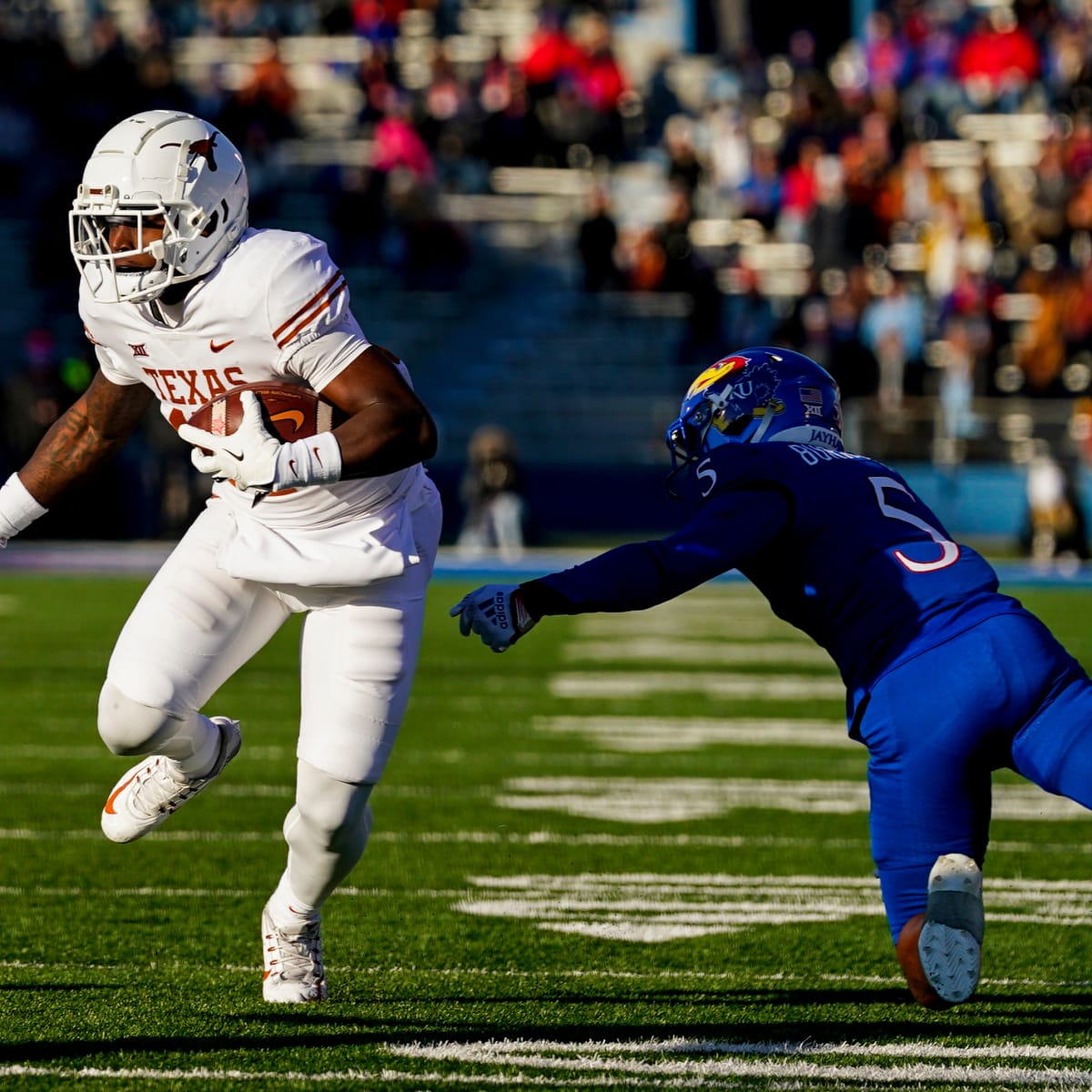 Texas Football returns to run first offense to defeat Kansas 55-14