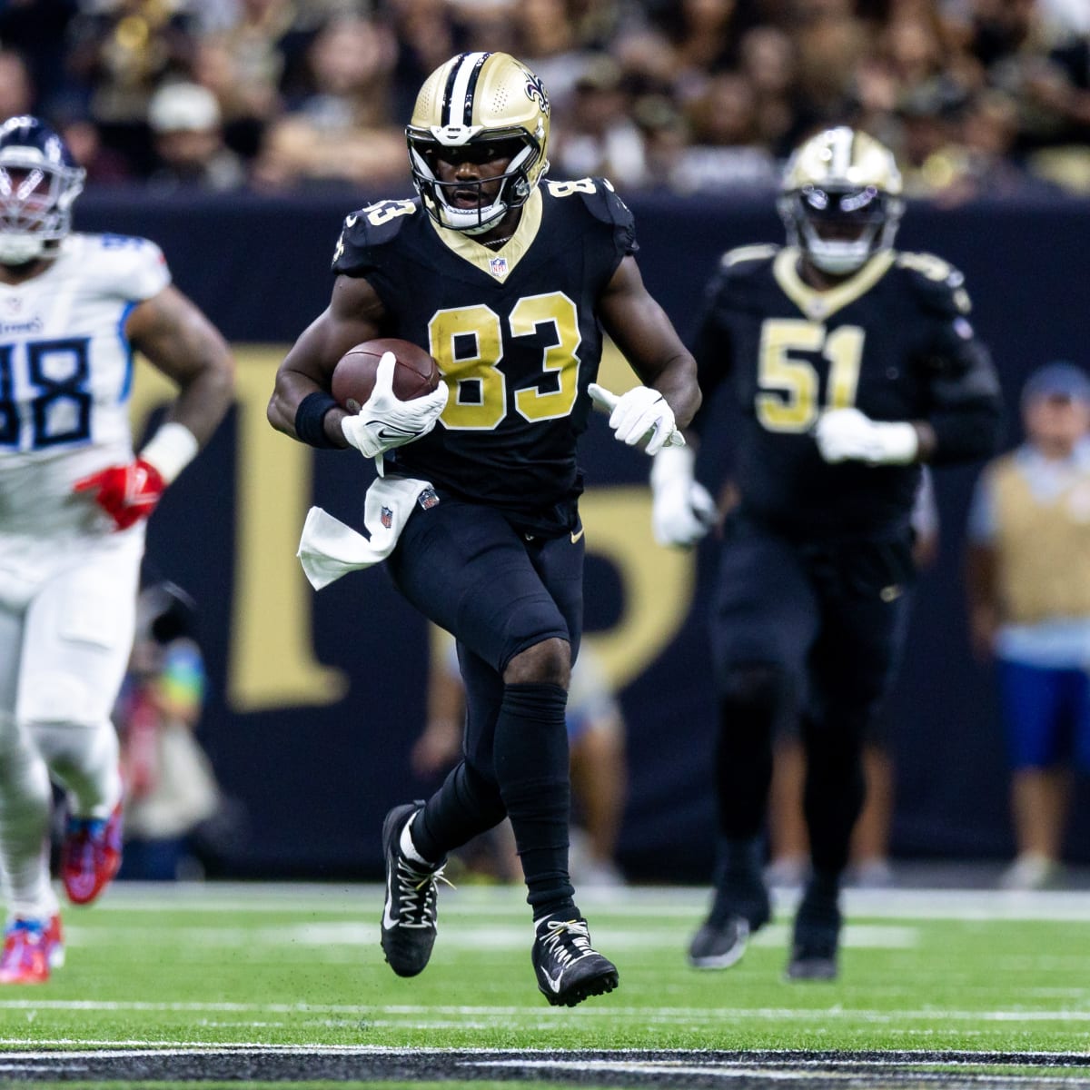 New Orleans Saints tight end Juwan Johnson (83) is tackled by San