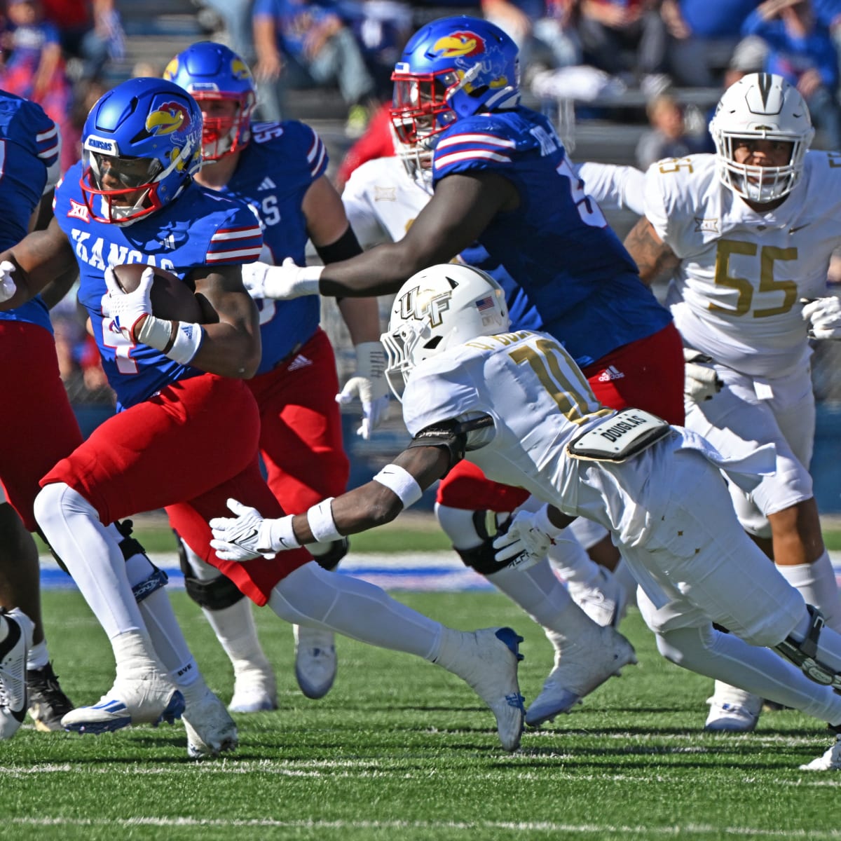 Daniel Hishaw Jr. rushes for a three-yard TD to extend Kansas' lead against  UCF