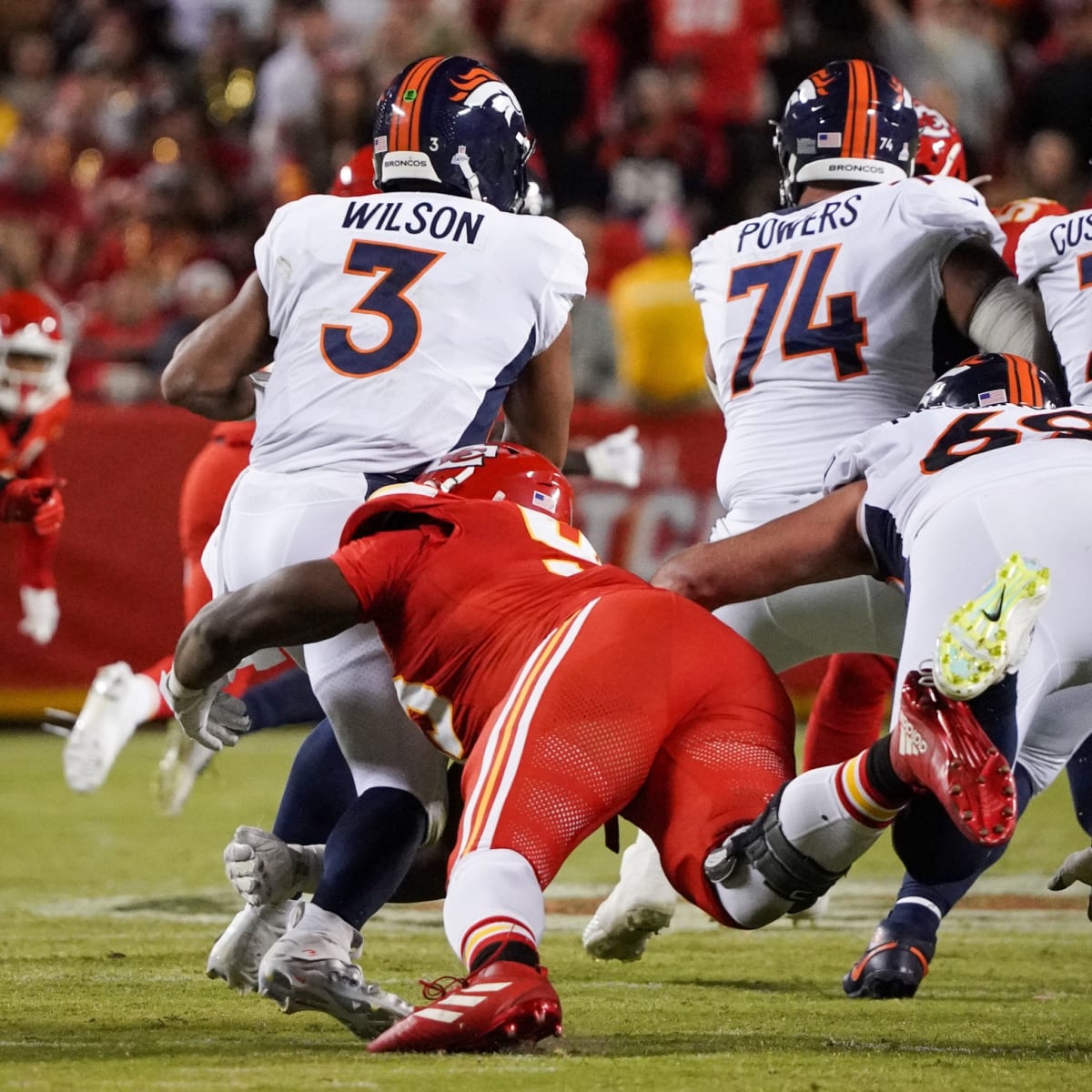 Wilson sacked 6 times, picked off late as Denver loses again