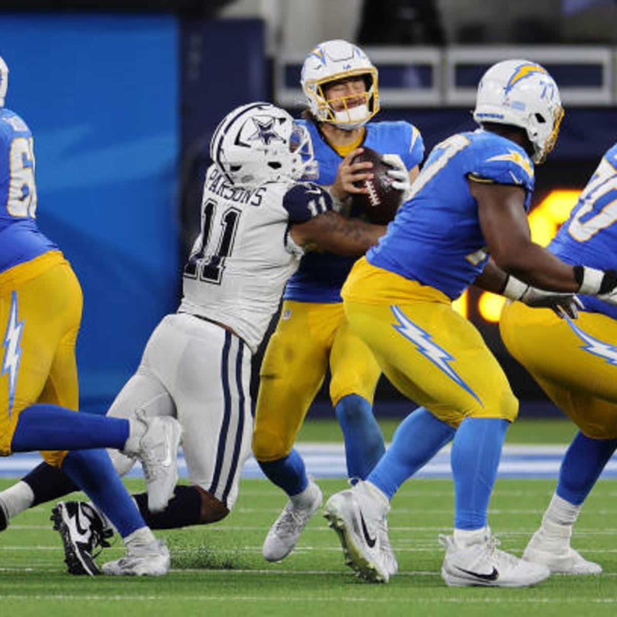 The Latest: Cowboys-Chargers make NFL 14-11 halftime history