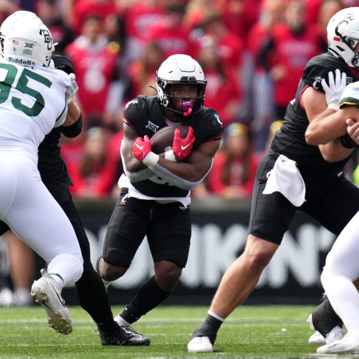 Cincinnati Football on X: Breaking in the new turf. 😍 #Bearcats