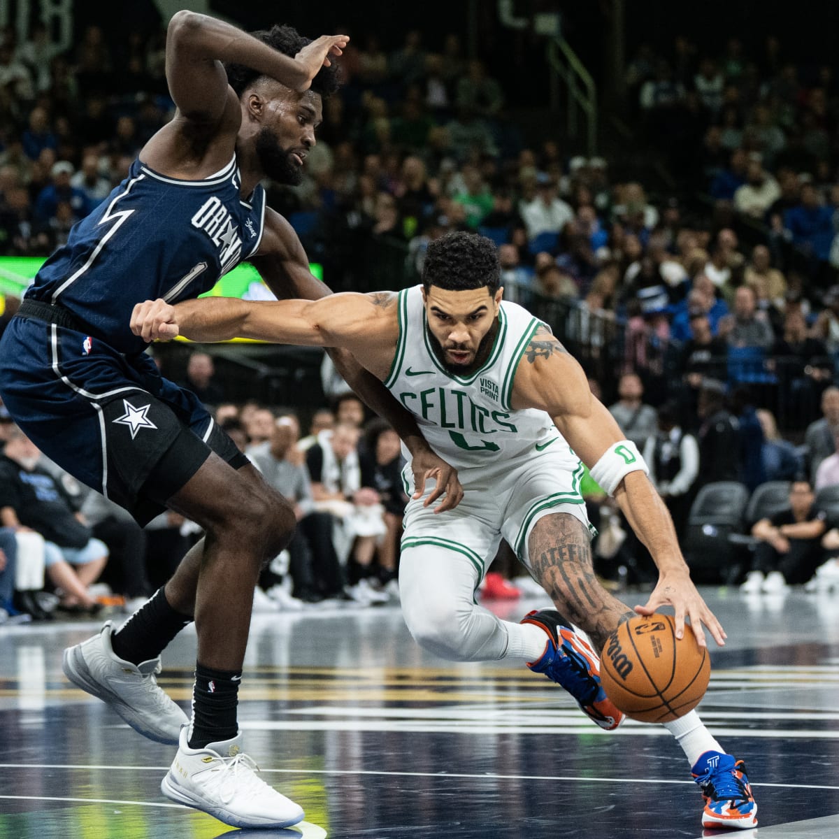 https://www.si.com/.image/ar_1:1%2Cc_fill%2Ccs_srgb%2Cfl_progressive%2Cq_auto:good%2Cw_1200/MjAyNDQ3Nzc4NzE3MTE1NDA0/jonathan-isaac-jayson-tatum-celtics.jpg