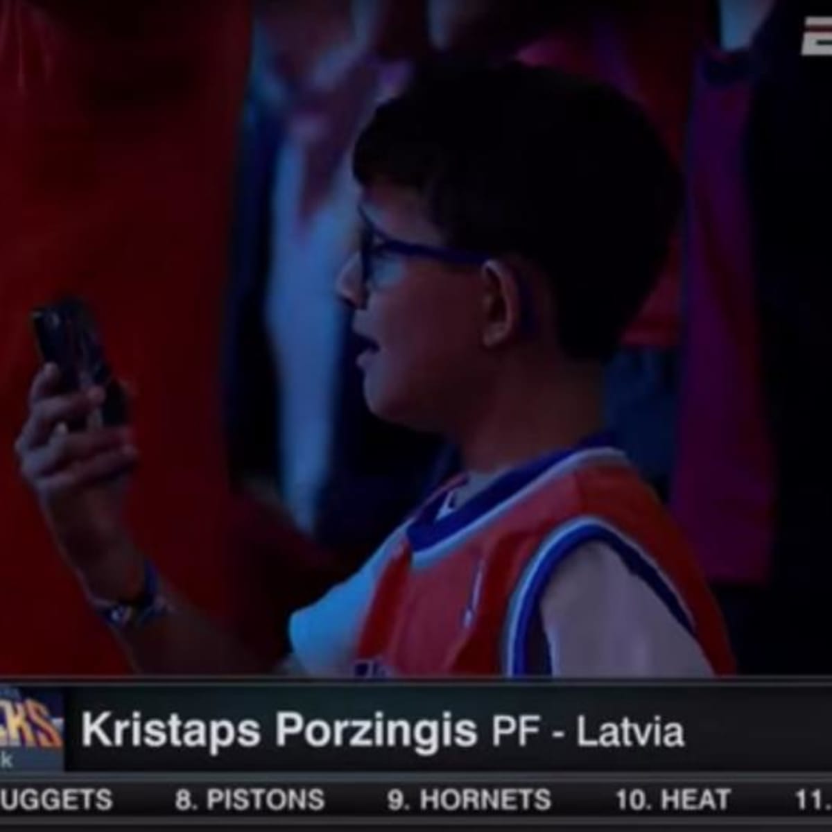 Kristaps Porzingis drinks in Knicks fans' boos