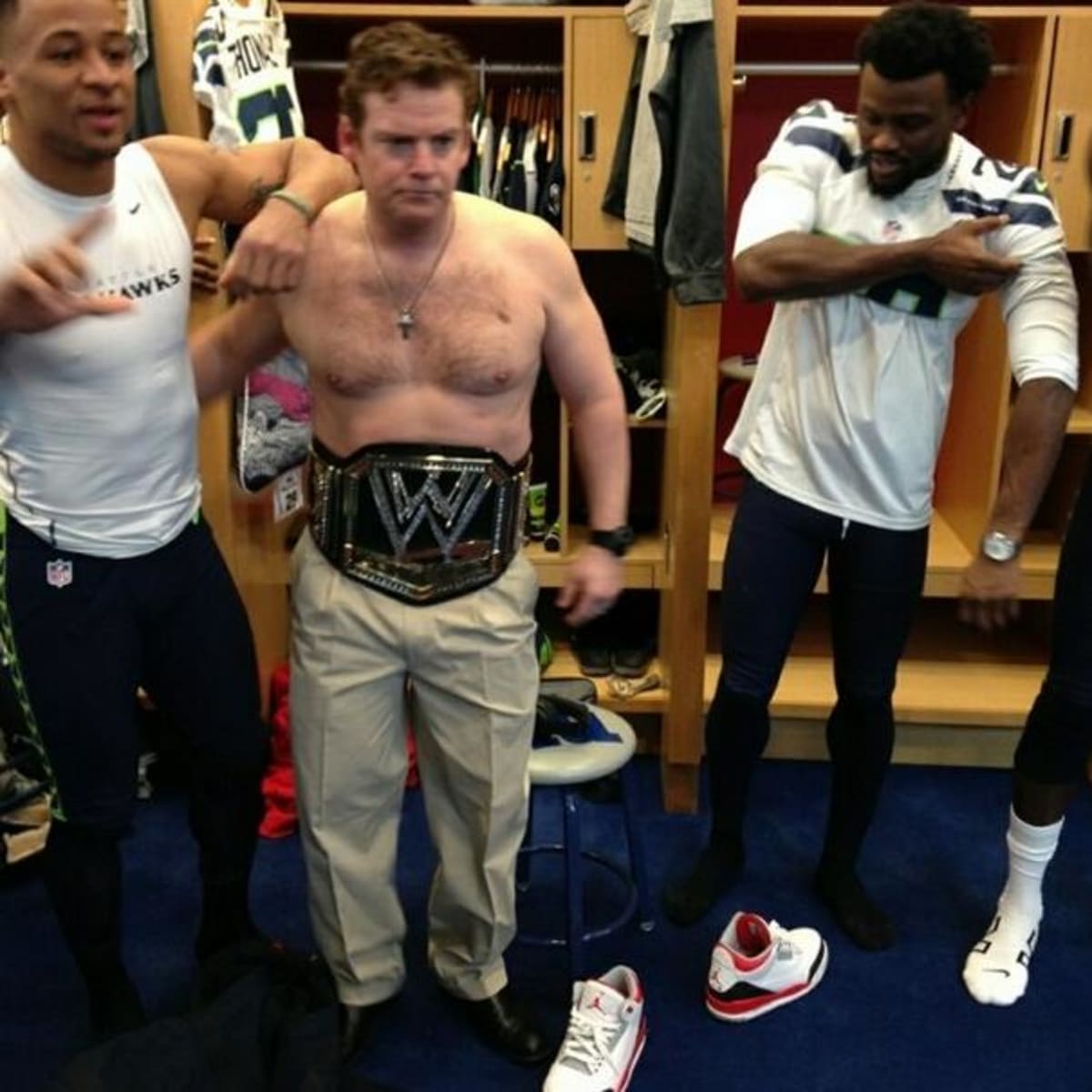 on X: John Schneider, #Seahawks GM shirtless with the WWE belt