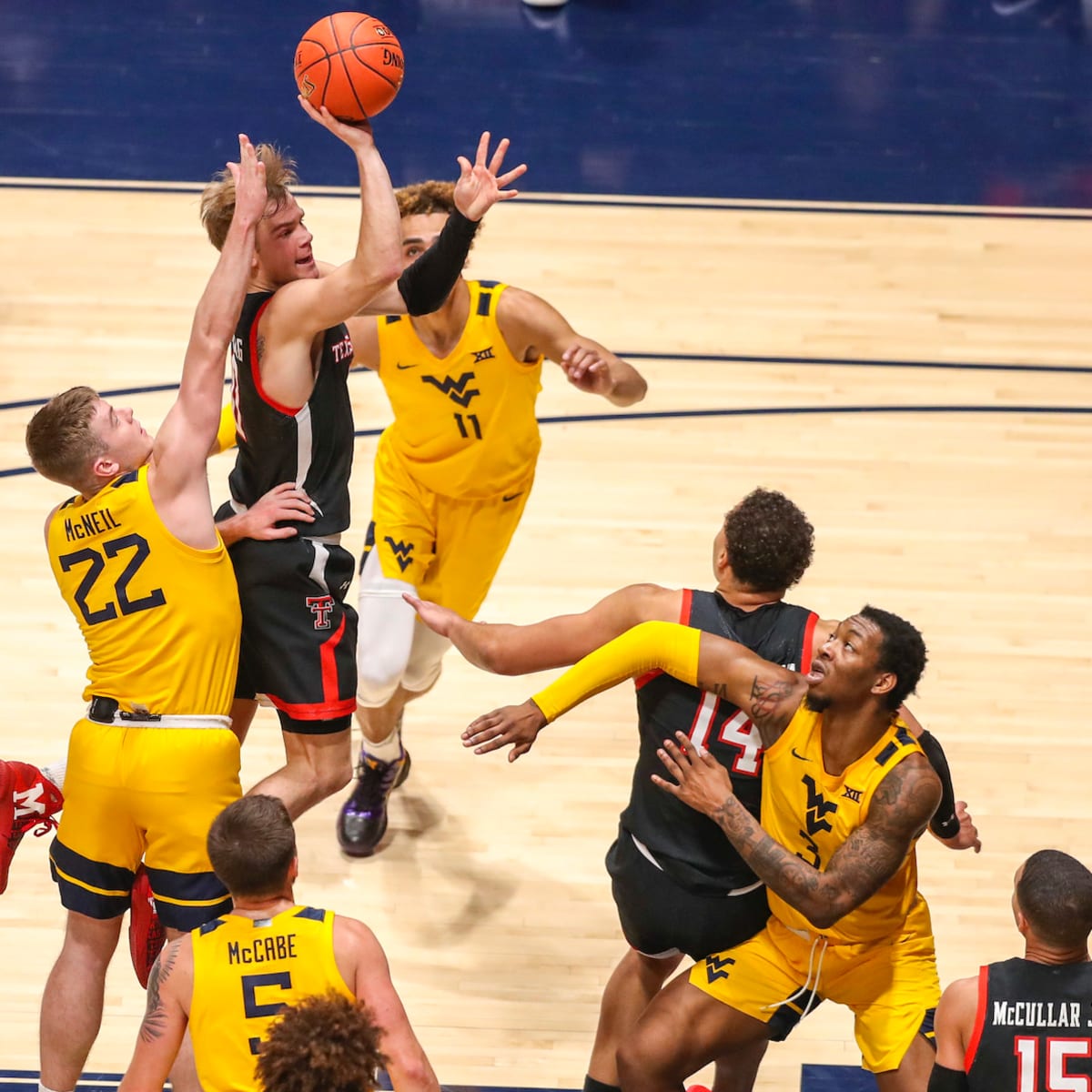 No. 14 West Virginia outlasts No. 7 Red Raiders