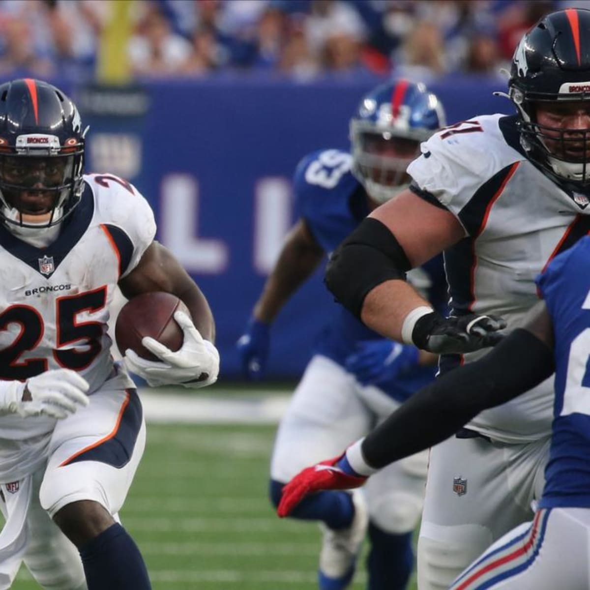 Denver Broncos offensive tackle Bobby Massie (70) gets set on the