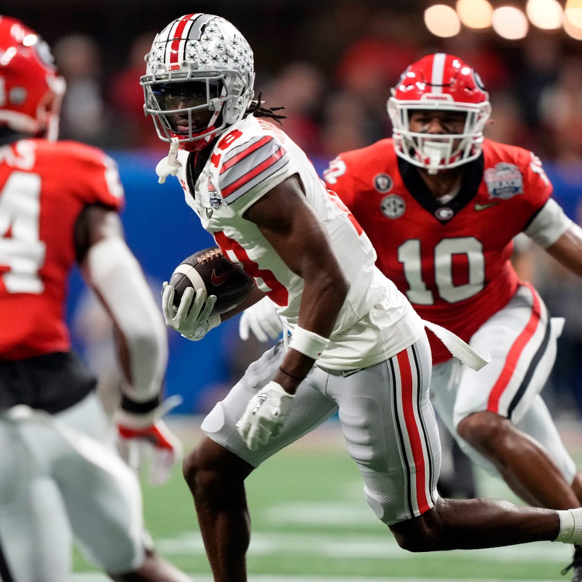 Javon Bullard signs photo of Ohio State WR Marvin Harrison Jr. hit with  'Night Night'