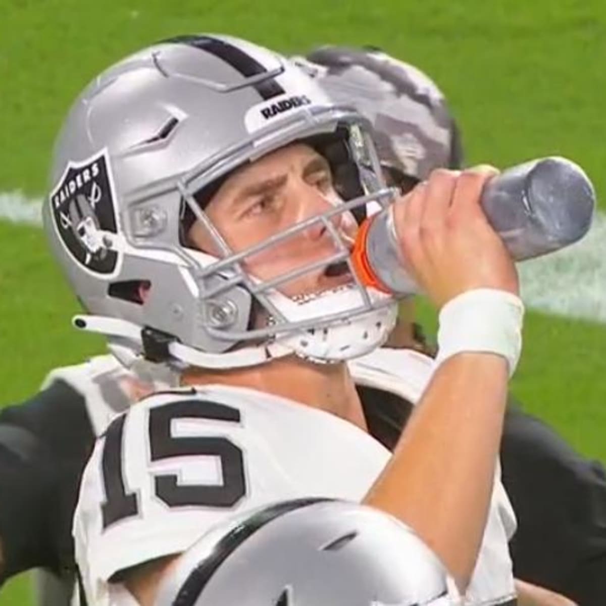 Las Vegas Raiders quarterback Chase Garbers (14) prepares to throw