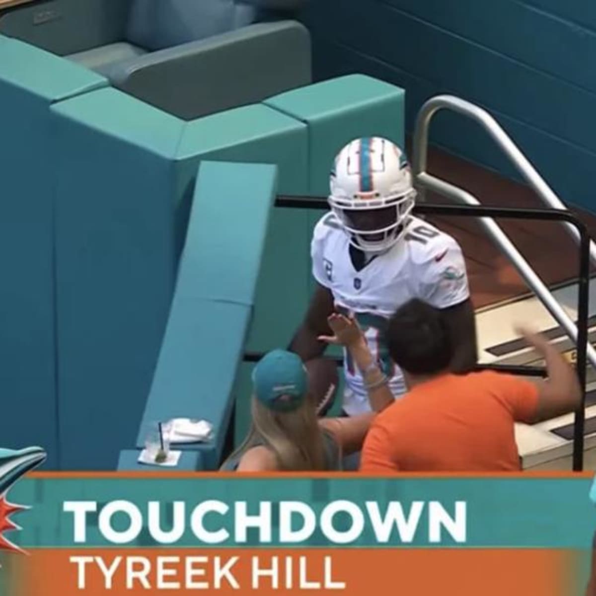 Tyreek Hill of the Miami Dolphins celebrates a touchdown catch