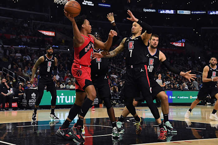 Toronto Raptors forward Scottie Barnes (4) controls the ball against Los Angeles Clippers guard Amir Coffey (7) during the second half at Crypto.com Arena