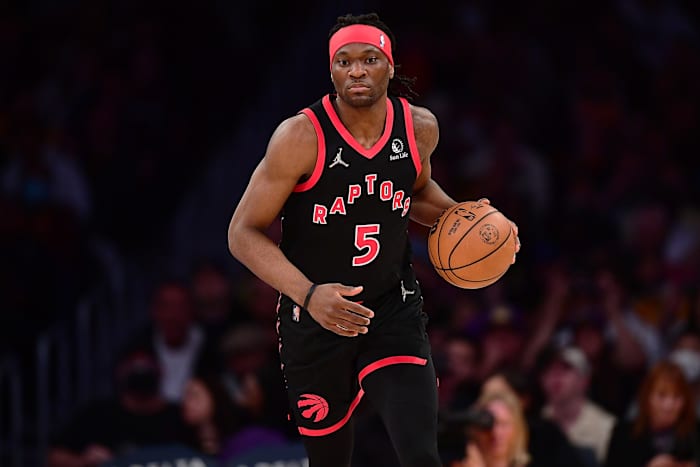 Toronto Raptors forward Precious Achiuwa (5) brings the ball up court against the Los Angeles Lakers during the first half at Crypto.com Arena.