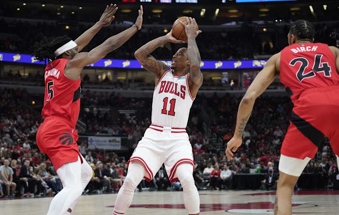 Toronto Raptors forward Precious Achiuwa (5) defends Chicago Bulls forward DeMar DeRozan (11) during the first quarter at United Center