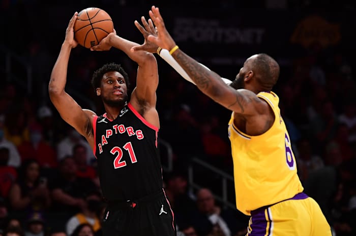 Toronto Raptors forward Thaddeus Young (21) shoots against Los Angeles Lakers forward LeBron James (6) during the first half at Crypto.com Arena