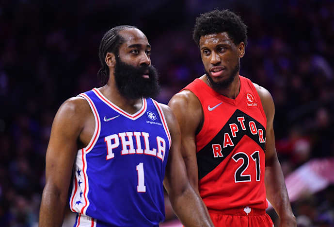 Toronto Raptors forward Thaddeus Young (21) looks to Philadelphia 76ers guard James Harden (1) in the second quarter at Wells Fargo Center