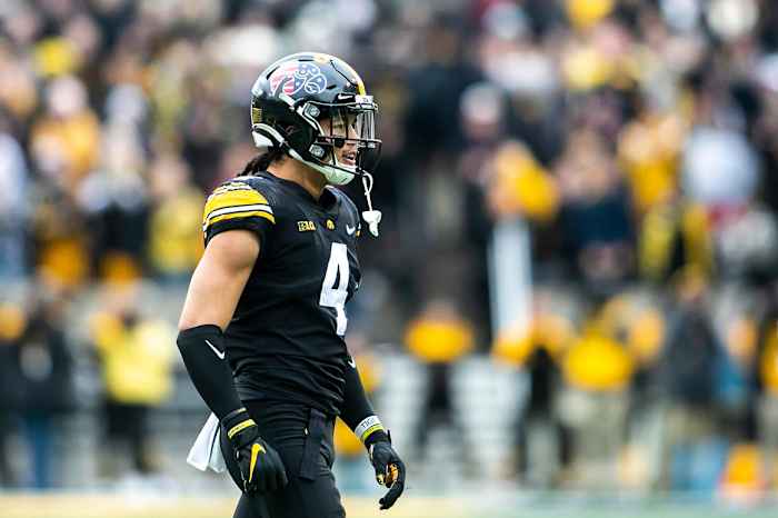 Iowa defensive back Dane Belton (4) reacts after a stop during a NCAA Big Ten Conference football game against Minnesota, Saturday, Nov. 13, 2021, at Kinnick Stadium in Iowa City, Iowa.