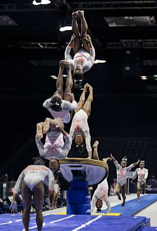 A sequence showing Biles completing the Yurchenko double pike in the vault competition at the GK U.S. Classic in May 2021.