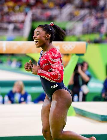 Biles celebrates at the Rio 2016 Olympics.