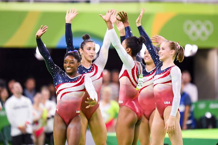 Biles pictured with teammates the Rio 2016 Olympics.