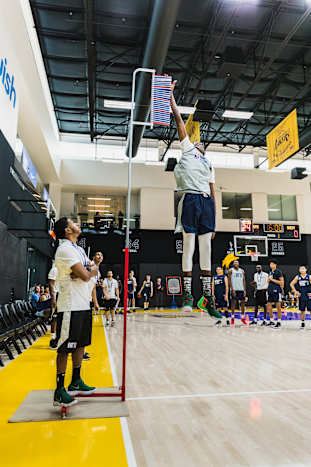 Christian Koloko, now of the Toronto Raptors, performs the vertical jump at the 2018 Basketball Without Borders camp in Los Angeles