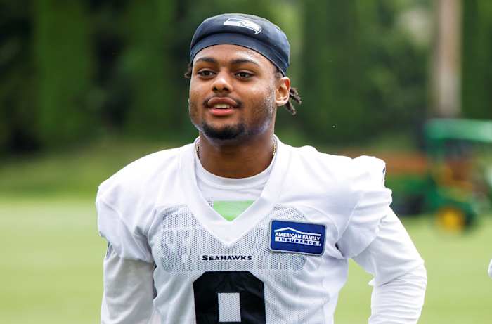 Seattle Seahawks cornerback Coby Bryant (8) jogs to the locker room following minicamp practice at the Virginia Mason Athletic Center Field