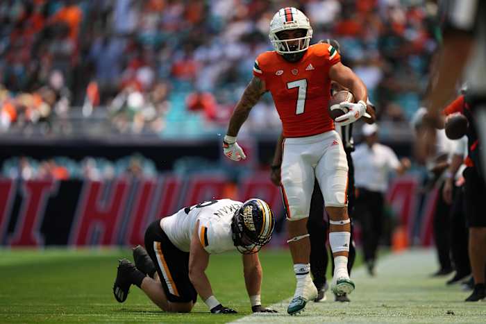 Miami Hurricanes wide receiver Xavier Restrepo (7) reacts after running the ball for a first down during the second half against the Southern Miss Golden Eagles at Hard Rock Stadium.