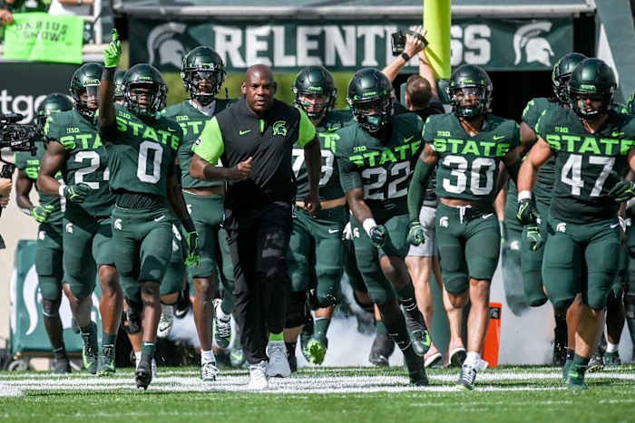 Coach Mel Tucker and the Michigan State Spartans take the field before the game against Akron on Saturday, Sept. 10, 2022, at Spartan Stadium in East Lansing. 220910 Msu Akron Fb 063a