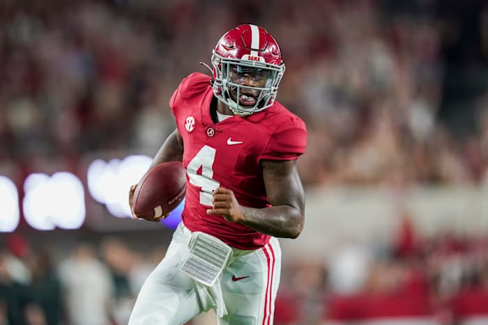 Alabama Crimson Tide quarterback Jalen Milroe (4) carries the ball against the Vanderbilt Commodores during the second half at Bryant-Denny Stadium.