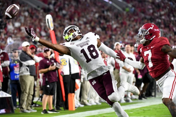 Mississippi State Bulldogs wide receiver Justin Robinson (18) cannot catch a pass in the end zone against Alabama Crimson Tide defensive back Eli Ricks (7) during the first half at Bryant-Denny Stadium.