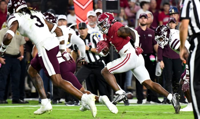 Alabama Crimson Tide running back Jahmyr Gibbs (1) runs for a touchdown against the Mississippi State Bulldogs during the first half at Bryant-Denny Stadium.