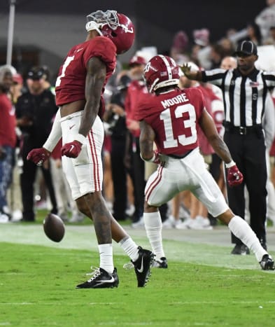 Alabama Crimson Tide defensive back Eli Ricks (7) celebrates after breaking up a pass against the Mississippi State Bulldogs during the first half at Bryant-Denny Stadium.