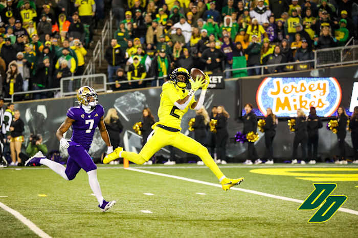 Oregon Ducks wide receiver Dont'e Thornton hauls in a touchdown against the Washington Huskies.