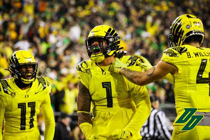 Noah Sewell celebrates a big play against the Washington Huskies.