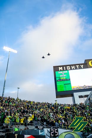 Fighter jets fly over Autzen Stadium before the Ducks played the Huskies.