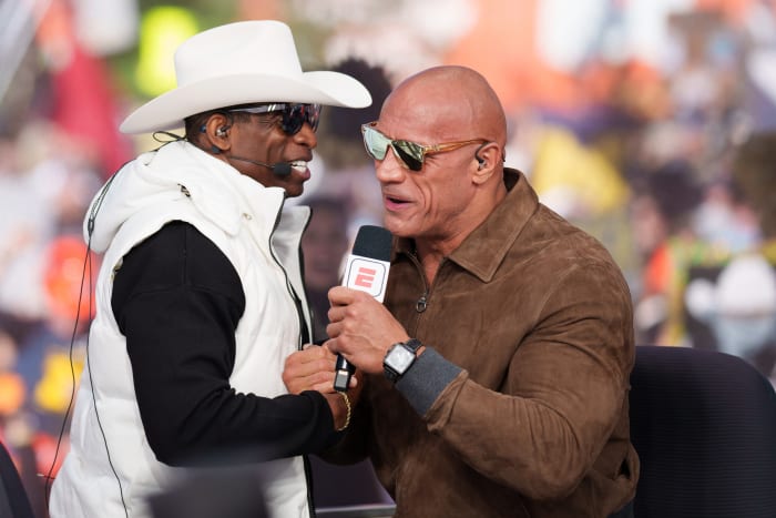 Colorado Buffaloes head coach Deion Sanders and celebrity guest picker Dwayne Johnson on the set of ESPN College GameDay prior to the game between the Colorado Buffaloes and the Colorado State Rams at Folsom Field