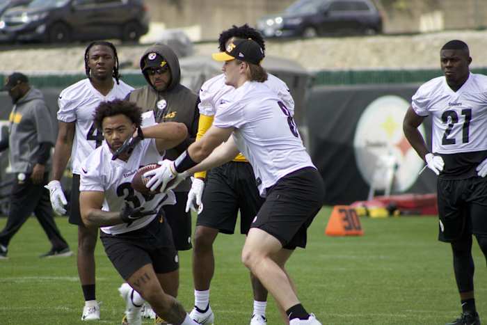 Kenny Pickett works the option during the first day of practice.