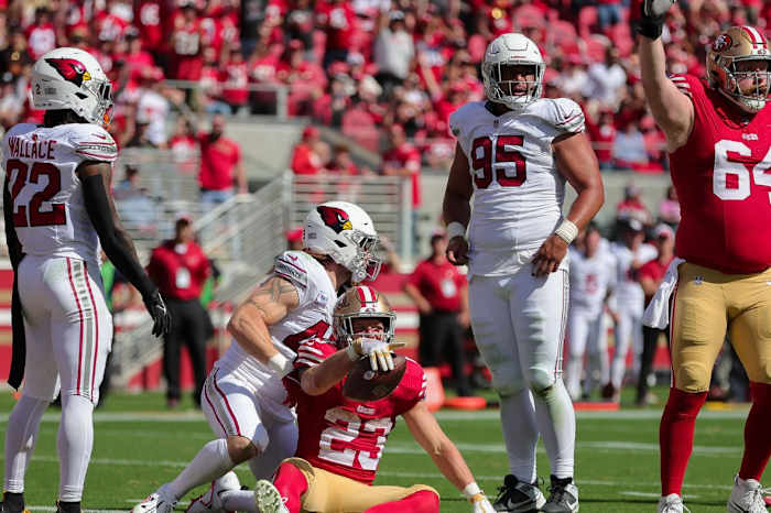 San Francisco 49ers running back Christian McCaffrey (23) scores a touchdown during the second quarter against the Arizona Cardinals at Levi's Stadium.