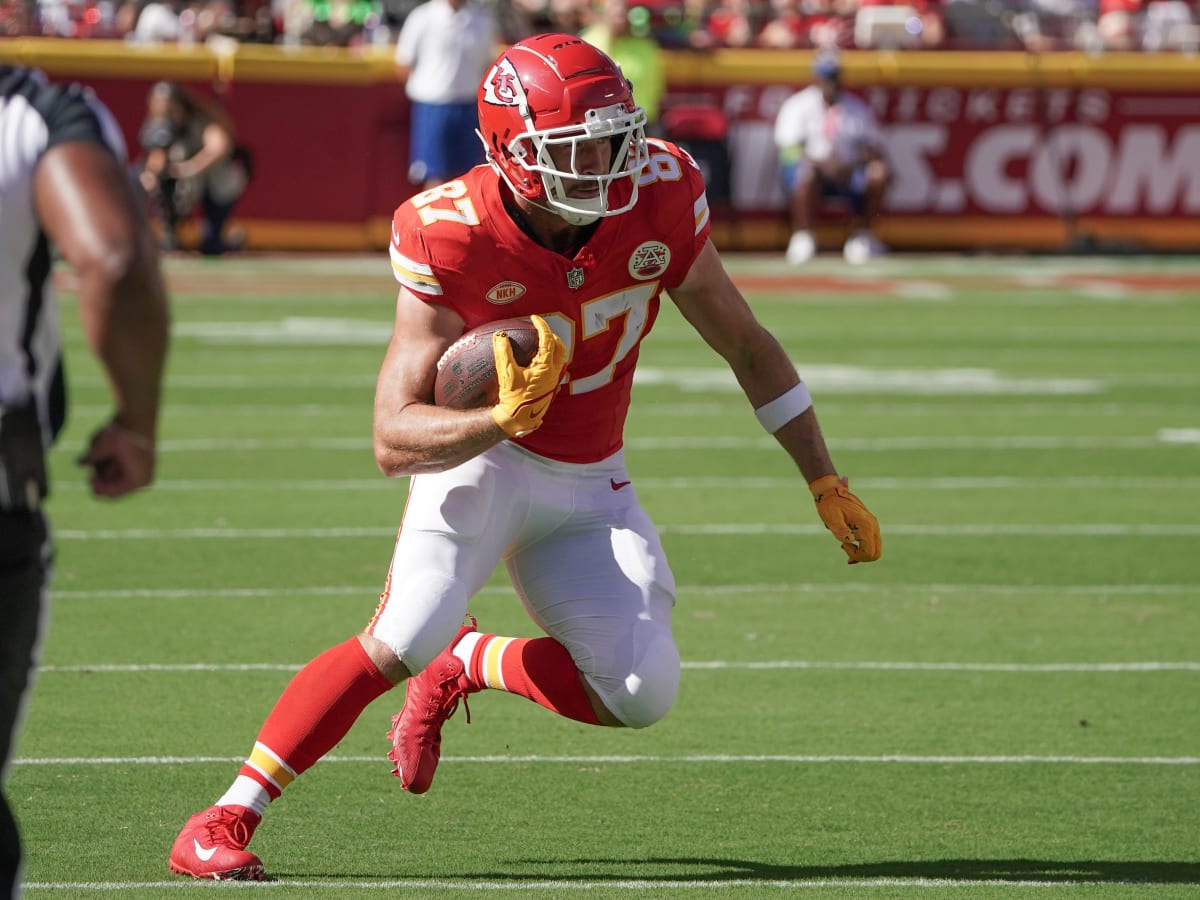 Travis Kelce Wears Air Jordan 14 Sneakers at Chiefs Parade