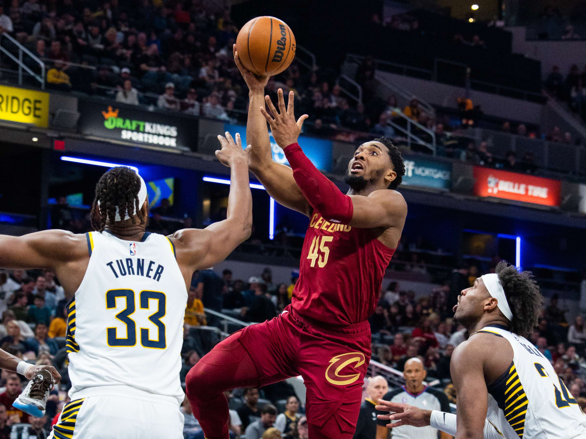 Donovan Mitchell injury updates: Cavaliers SG returns to bench after  briefly going to locker room Tuesday vs. Nets - DraftKings Network